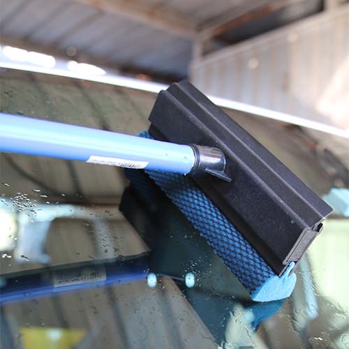Ettore automotive squeegee removing water from car windshield