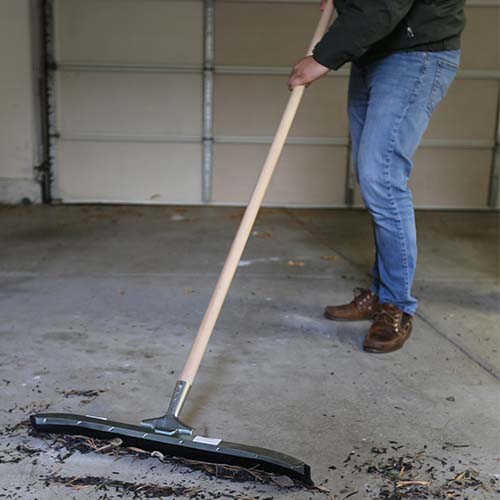 Wooden Pole with Curved Steel Floor Squeegee Cleaning Floor